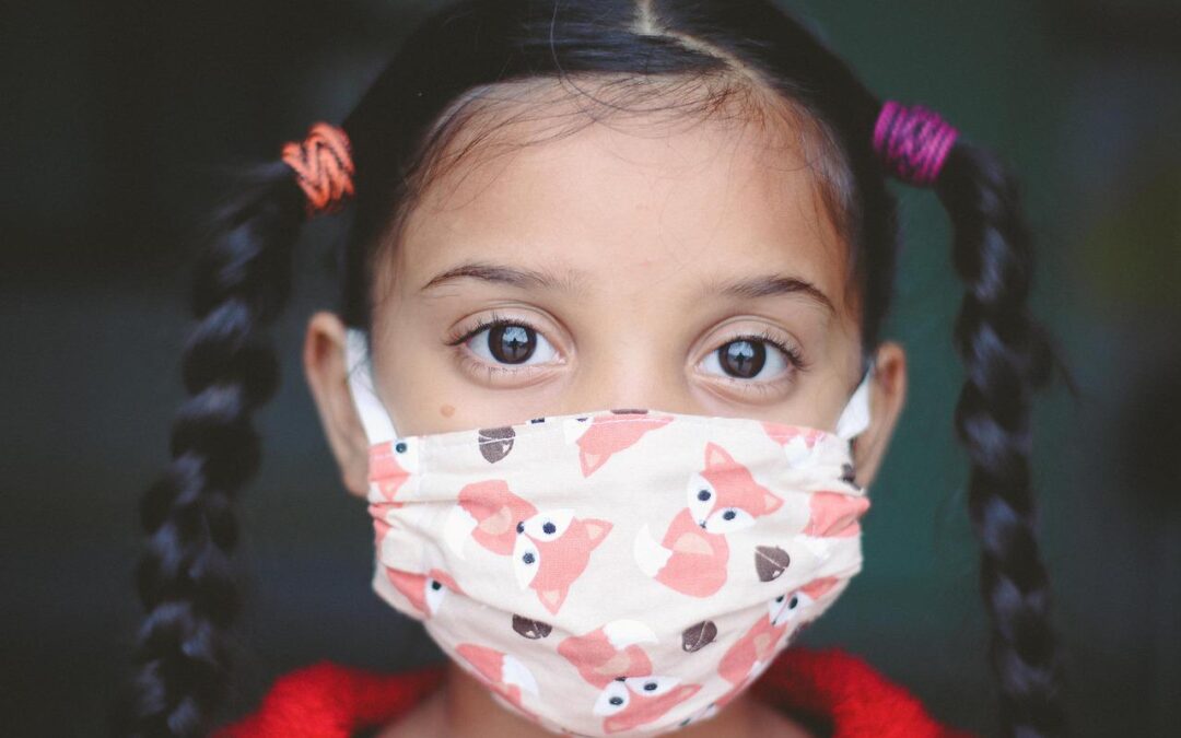 Young girl wearing COVID mask